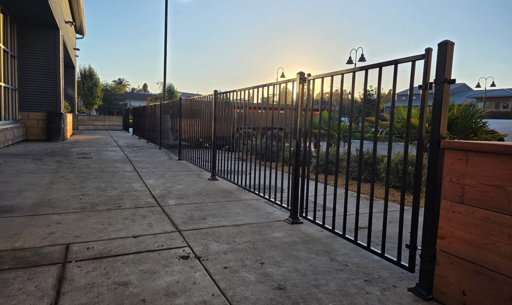 Black iron picket fence installation